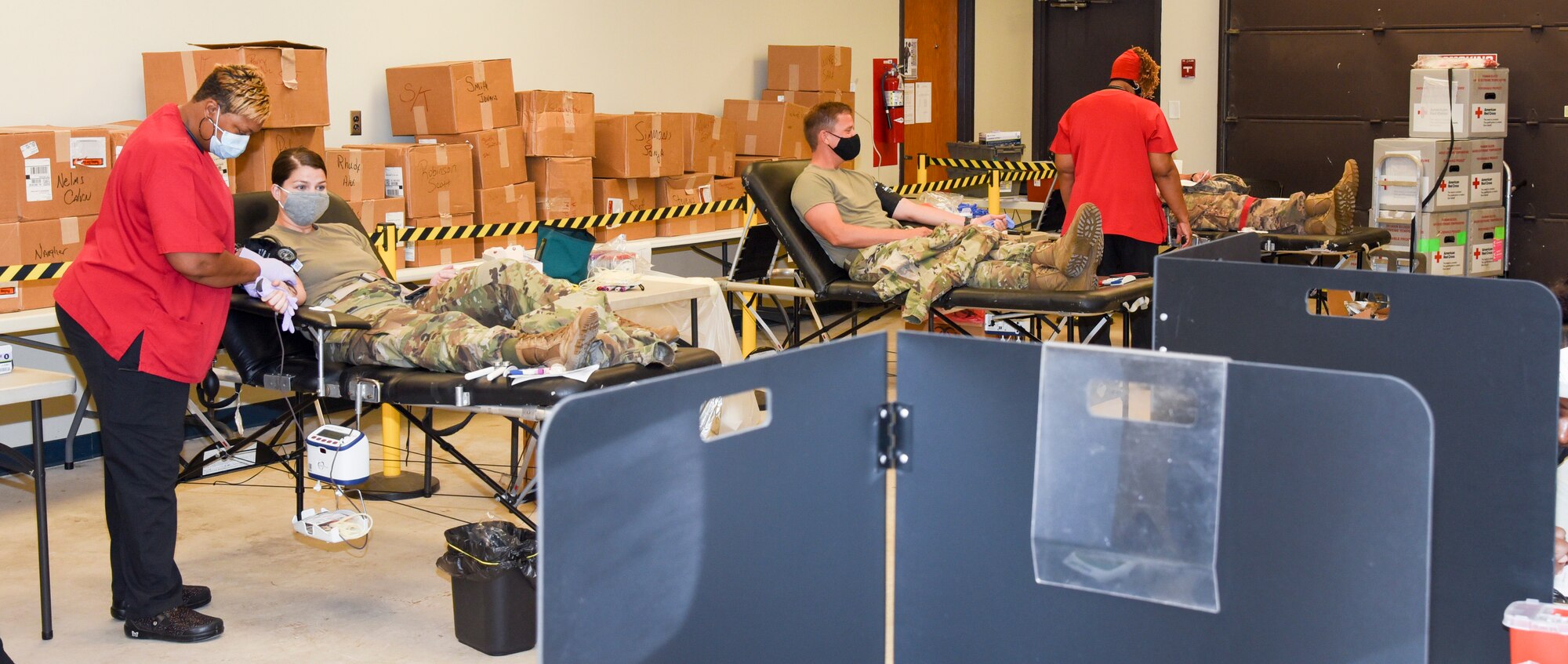 Members of the 117th Air Refueling Wing participate in a blood drive on Aug. 14, 2020 at Sumpter Smith JNGB, Ala. 
The donated blood went to local blood banks and will be used for conventional purposes like blood transfusions but extra vials of blood were taken to test for COVID-19 antibodies. Angelita Robinson, collection specialist II for the American Red Cross, explained that she’s done thousands of blood drives in her 20 years with AMCROSS but testing for COVID-19 antibodies is a new step they have added.
	“It's to check to see if a donor has the antibody,” Robinson said. “If a donor recovered from the Coronavirus they would have antibodies still in their blood systems.” 
According to Robinson, having the antibodies in the bloodstream doesn’t mean a person currently has COVID-19. 
“Any time a person has an illness or condition certain antibodies are built up in the blood,” she said. “A person who does have the antibodies will be wanted to donate plasma so they can develop some kind of vaccine.” 
A donated unit of blood will be put in extra vials that go to a lab. Tests are conducted in labs using a plasma process for the antibodies which can be used in a vaccine. Even without testing of antibodies donated blood can help save a life.
“We still need blood for patients that are in the hospital like accident victims or people who need transfusions for surgeries,” Robinson said.