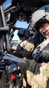 New York Army National Guard aviators Chief Warrant Officer 4 Tom Scott and Chief Warrant Officer 3 Aaron Chiu, assigned to the 3rd Battalion, 142nd Aviation Regiment, prepare to perform a test flight on a UH-60M Black Hawk helicopter at the Sikorsky fielding facility in Lakehurst, N.J., Aug. 18, 2020. The New York National Guard aviation battalion is scheduled to field 20 aircraft fresh from the factory over the coming year with another 10 rounding out the battalion's elements assigned in Maine and Connecticut.