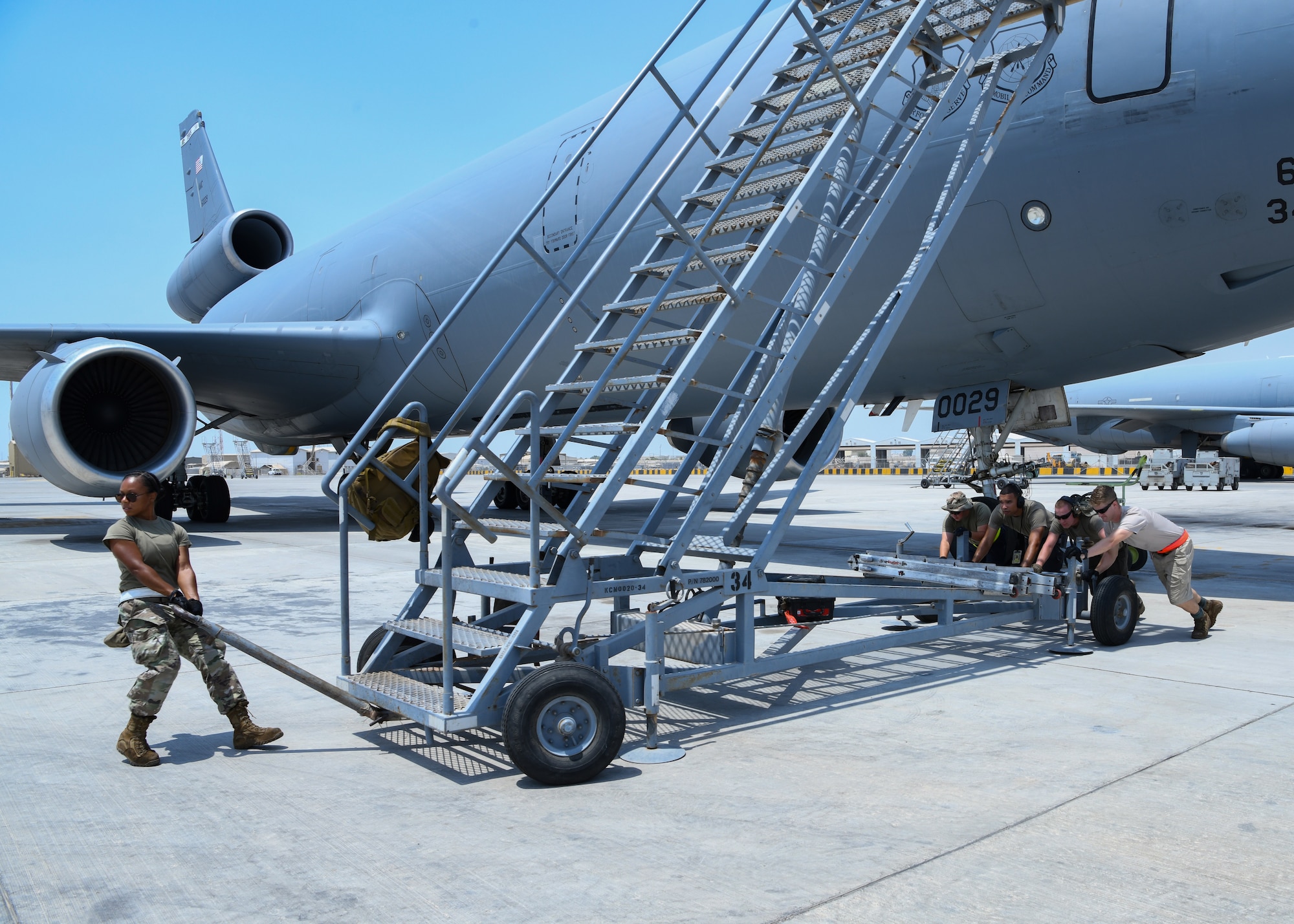 Maintainers from the 380th Expeditionary Maintenance Squadron prepare for the launch of a KC-10 Extender at Al Dhafra Air Base, United Arab Emirates, Aug. 18, 2020.
