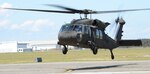 A new UH-60M Black Hawk helicopter assigned to the New York Army National Guard's 3rd Battalion, 142nd Aviation Regiment, comes in to land at their flight facility in Ronkonkoma, N.Y., Aug. 18, 2020. The UH-60M is the most current version of the Black Hawk and offers more efficient rotor blades, glass cockpit, improved engines, flight controls and aircraft navigation.