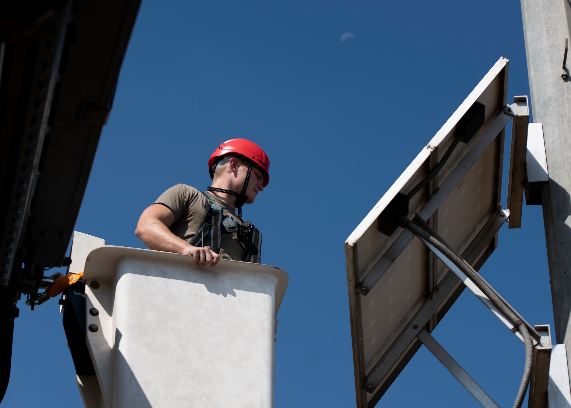 Senior Airman Noah Dray checks on a Big Voice loud speaker tower from a bucket lift as Incirlik Air Base, August 12, 2020.