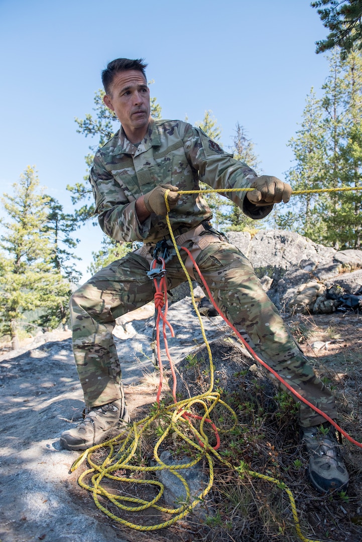 Special warfare tactical air control party Airmen from the 124th Air Support Operations Squadron along with two A-10 Thunderbolt II’s from the 190th Fighter Squadron conduct cliffside search and rescue training with members of the Idaho Mountain Search and Rescue team and the Navy’s Helicopter Sea Combat Squadron Four from North Island Naval Air Station, California, in McCall, Idaho, Aug. 13, 2020.