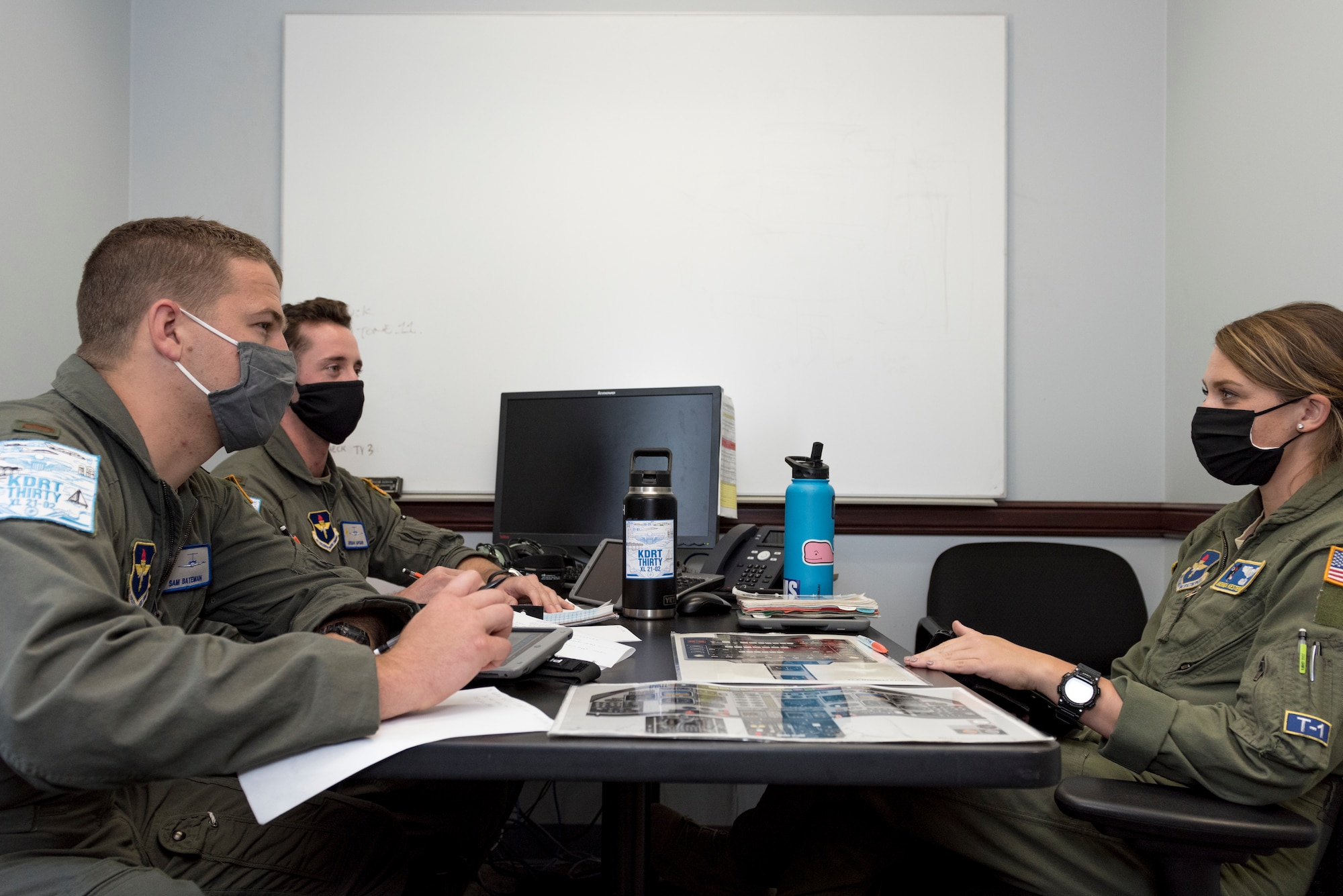 Capt. Monica Kestermann, 86th Flying Training Squadron instructor pilot leads 2nd Lieutenants Sam Bateman and Josiah Apgar in a pre-flight brief, Aug. 11, 2020 at Laughlin Air Force Base, Texas. Kestermann says the women she flies with share endless experiences and are invaluable resources about anything from flying to career advice to balancing family and work. For her, it’s wonderful to have a group like the Female Aviators’ Mentorship Group at Laughlin to rely on. (U.S. Air Force photo by Senior Airman Anne McCready)