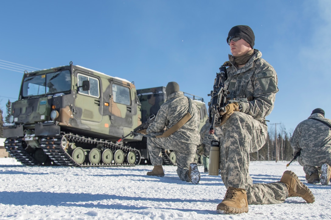 Guardsmen of Charlie Company 1-297th Infantry out of Wyoming participate in cold weather and arctic skills training during Arctic Eagle 2018 at the Donnelly Training Area outside of Fort Greely, AK March 1, 2018. Realistic training in cold weather conditions challenges participants to test field-craft skills, remote communications capability, and validate arctic transportation capabilities.

(U.S. Army National Guard photo by Spc. Michael Risinger/Released