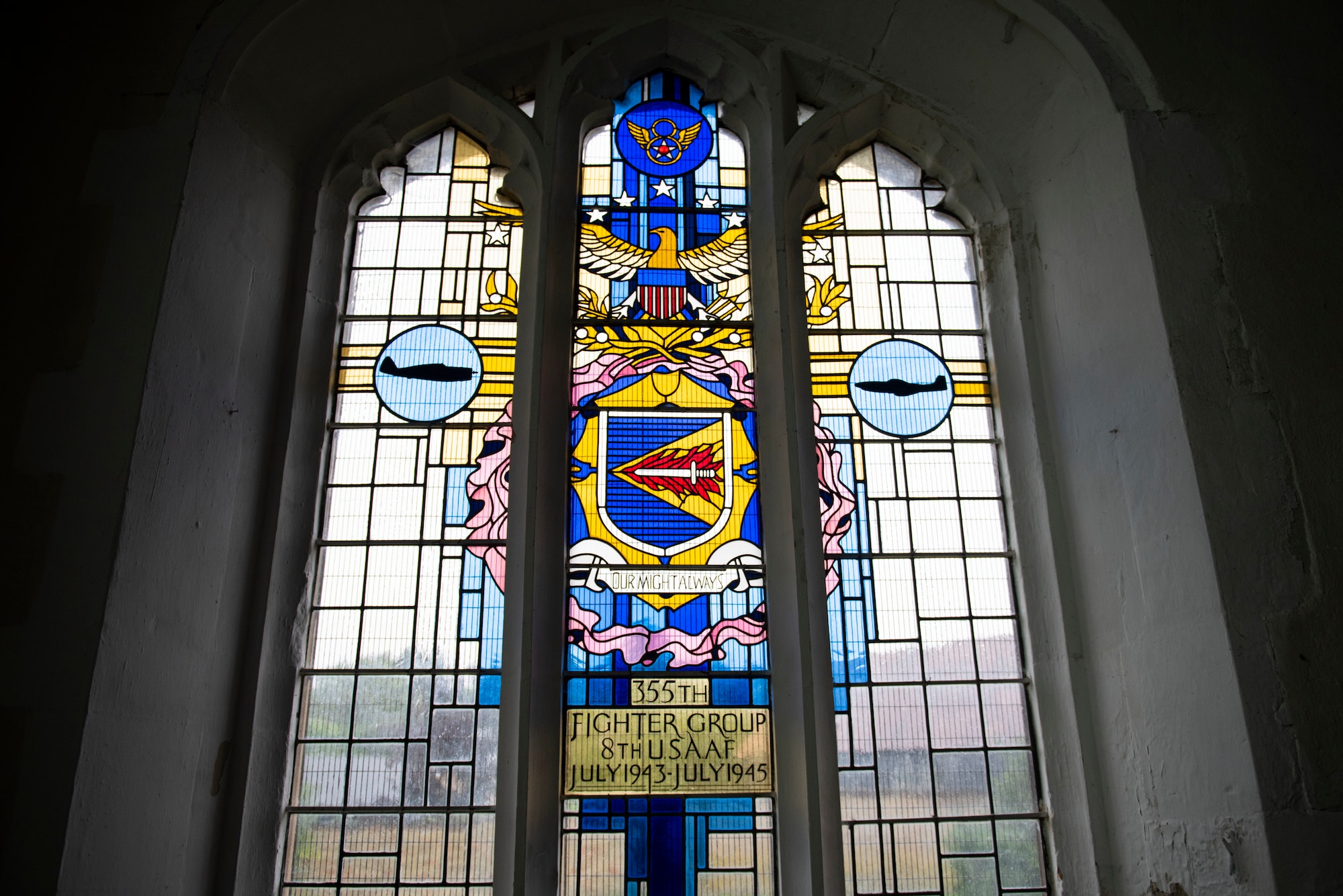 A memorial window at St. Catherine’s Church in Litlington, England, stands to commemorate all the American service members who served at RAF Steeple Morden. During World War II, 175 of those Airmen died and many became prisoners of war. U.S. Africa Command Directorate for Intelligence at RAF Molesworth partnered with the American Battle Monuments Commission to host Operation TORCH-2020, where over 50 military members and their families, U.K. nationals and Boy Scout Troop #245, cleaned six WWII memorial sites to preserve American service member legacies and promote an appreciation of past American heroes among present-day USAFRICOM workforce and families. (U.S. Air Force Photo by Airman 1st Class Jennifer Zima)