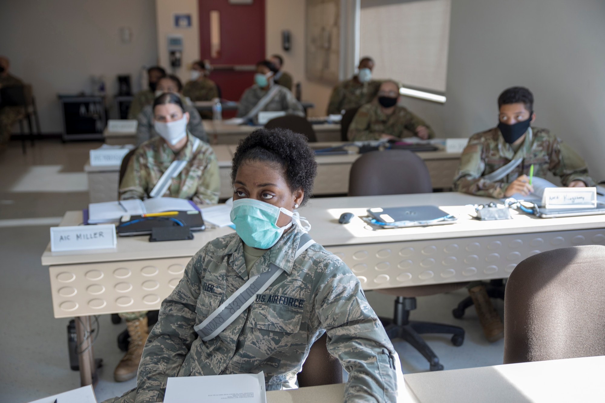 Military students in class wearing masks.