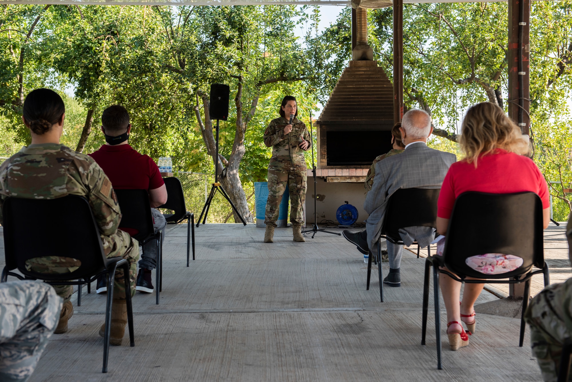 Col. Shelly Mendieta addresses the Airmen of the 717th Air Base Squadron.