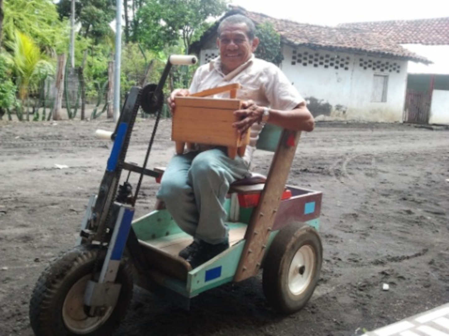 A Nicaraguan man displays the shoeshine supplies he received via a shipment of humanitarian cargo from Wisconsin/Nicaragua Partners of the Americas Inc. The Wisconsin National Guard’s Company H, 132nd Brigade Support Battalion, helped transport the cargo to U.S. Air Force planes bound for Nicaragua as part of the National Guard’s State Partnership Program.