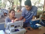 Community-based learning centers in Nicaragua use sewing machines provided via a shipment of humanitarian cargo from Wisconsin/Nicaragua Partners of the Americas Inc., with help from the Wisconsin National Guard as part of the National Guard’s State Partnership Program.