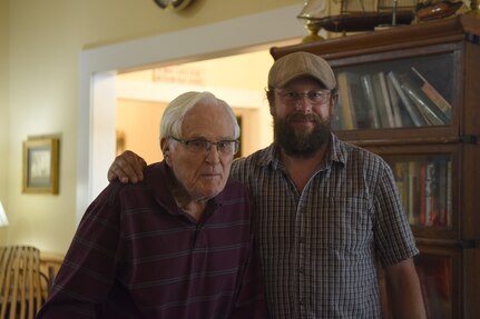Josh Mayes. 628th Air Base Wing Historian, poses with retired World War II veteran John Fisher Lammey, in Savannah, Ga., July 24, in 2020. Mayes interviewed for the Air Force Historical Research Agency at Maxwell air force base.