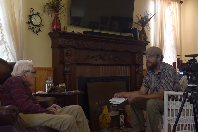 Josh Mayes. 628th Air Base Wing historian, interviews retired World War II veteran John Fisher Lammey, in Savannah, Ga, July 24, 2020. As a historian, Mayes is in charge of documenting and managing historical events, programs and functions at Joint Base Charleston S.C.