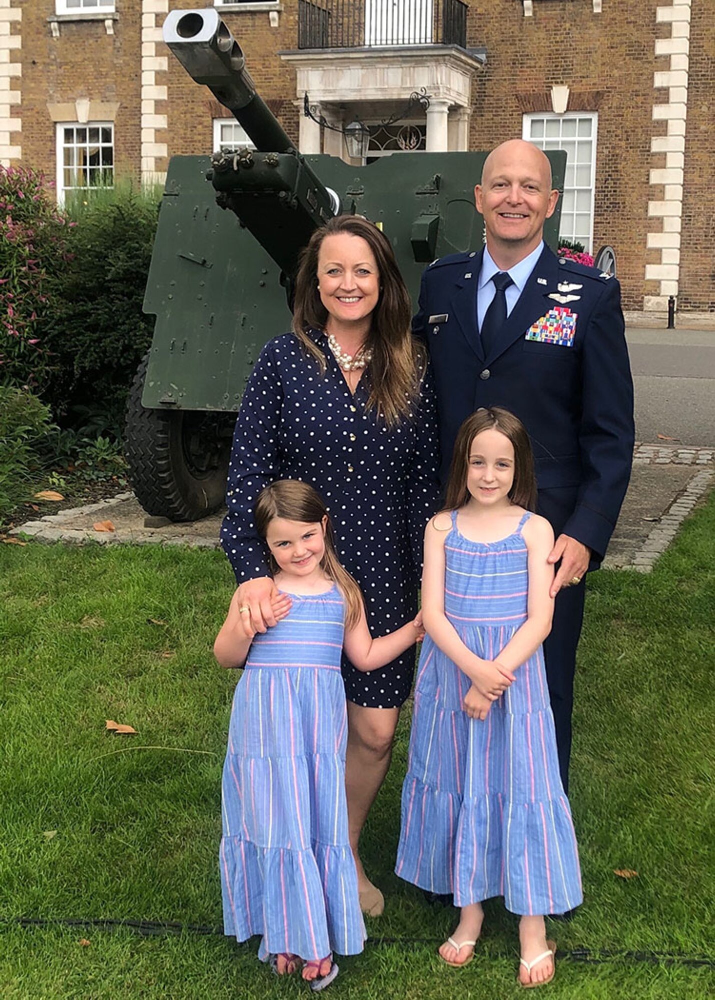 Col. Blaine Baker, top right, 100th Air Refueling Wing vice commander, poses for a photo with his wife and daughters at the Honorable Artillery Company in London, England, July 15, 2020. Baker arrived at RAF Mildenhall in July 2020 for his first KC-135 assignment, after previously having flown as a pilot on the  C-17 Globemaster and Electronic Warfare Officer on the AC-130U Gunship. (Courtesy photo)
