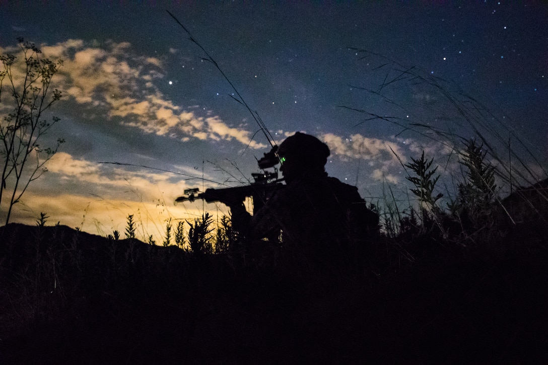 A U.S. Marine scans a road for notional enemies during a Marine Corps Combat Readiness Evaluation on Marine Corps Base Camp Pendleton, Calif., Aug. 12.