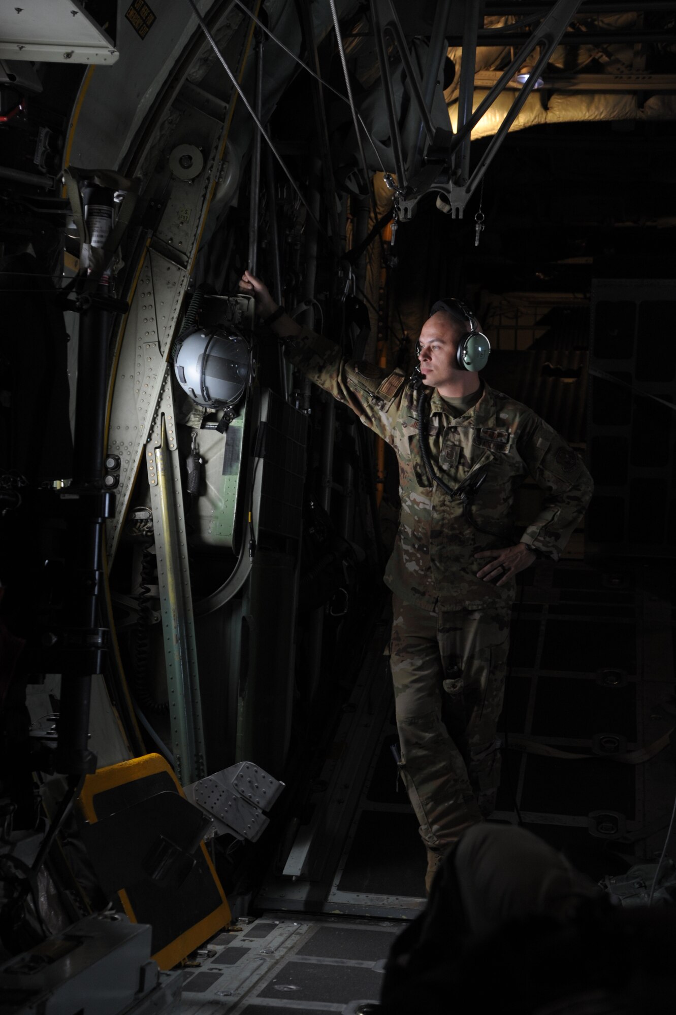 a man looks out an aircraft window