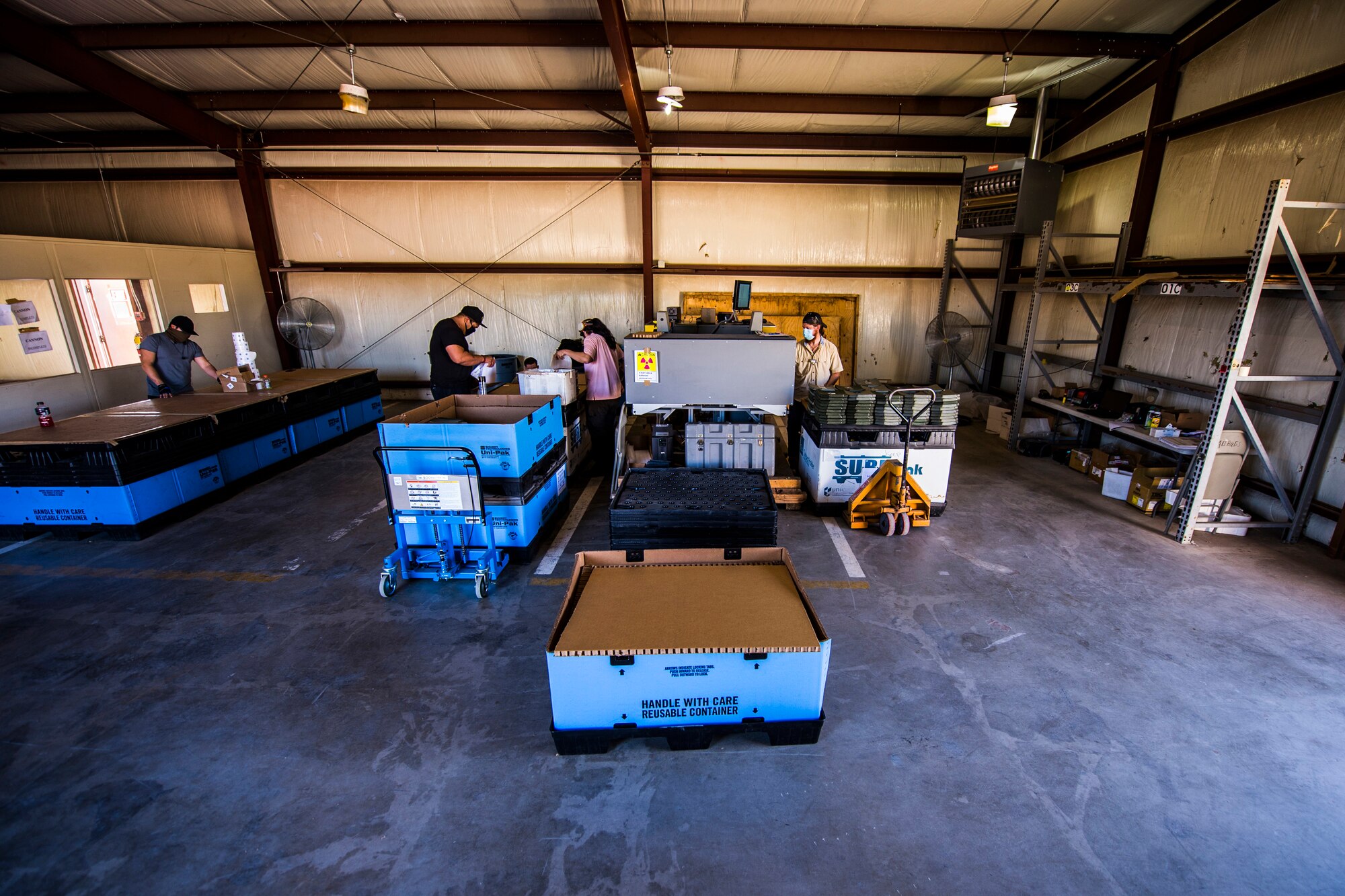 Non-Destructive Testing Equipment team members conduct testing on hard armor body inserts at a facility on Cannon Air Force Base, N.M., Aug. 4, 2020. The team is tasked by the United States Army Tank-Automotive and Armaments Command, who in this case, coordinated with the Air Force Material Command to establish a plan for teams to visit Air Force bases in 2020. (U.S. Air Force photo by Staff Sgt. Luke Kitterman)