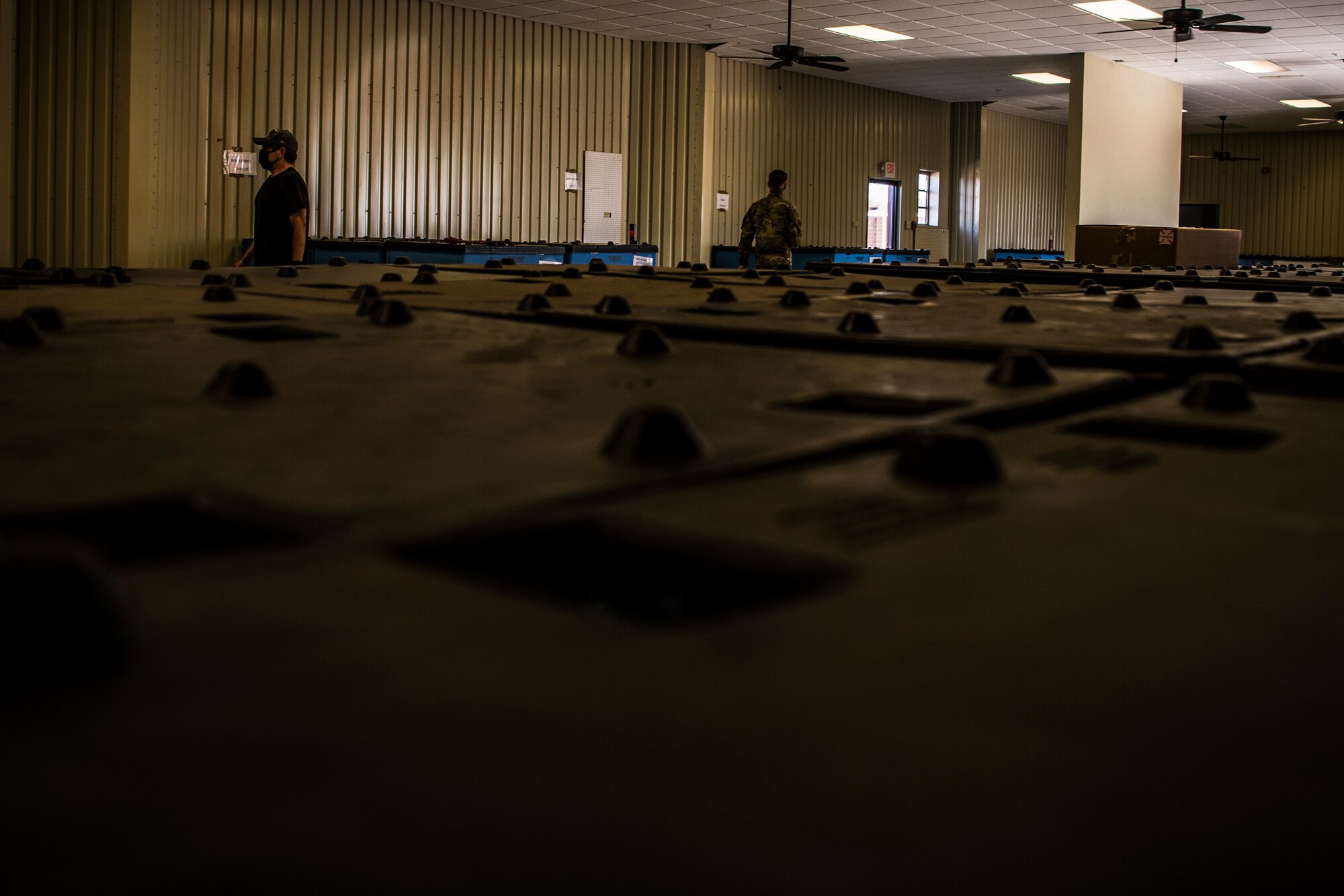 Numerous shipping containers holding tested, or waiting-to-be tested, armor plates sit inside a 27th Special Operations Logistics Readiness Squadron facility at Cannon Air Force Base, N.M, Aug. 4, 2020. The 27 SOLRS directly supported a Non-Destructive Testing Equipment team’s visit to Cannon where they tested the integrity of over 21,000 armor plates. (U.S. Air Force photo by Staff Sgt. Luke Kitterman)