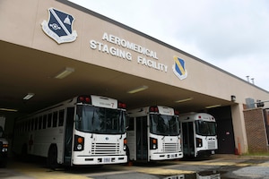 Medical transport buses await their departure to pick up patients arriving from Landstuhl Regional Medical Center in Kaiserslautern, Germany, at Joint Base Andrews, Md., Aug. 13, 2020. Buses are used to transport patients from the flight line at JBA, back to the Aeromedical Staging Facility or other nearby medical facilities. (U.S. Air Force photo by Airman 1st Class Spencer Slocum)