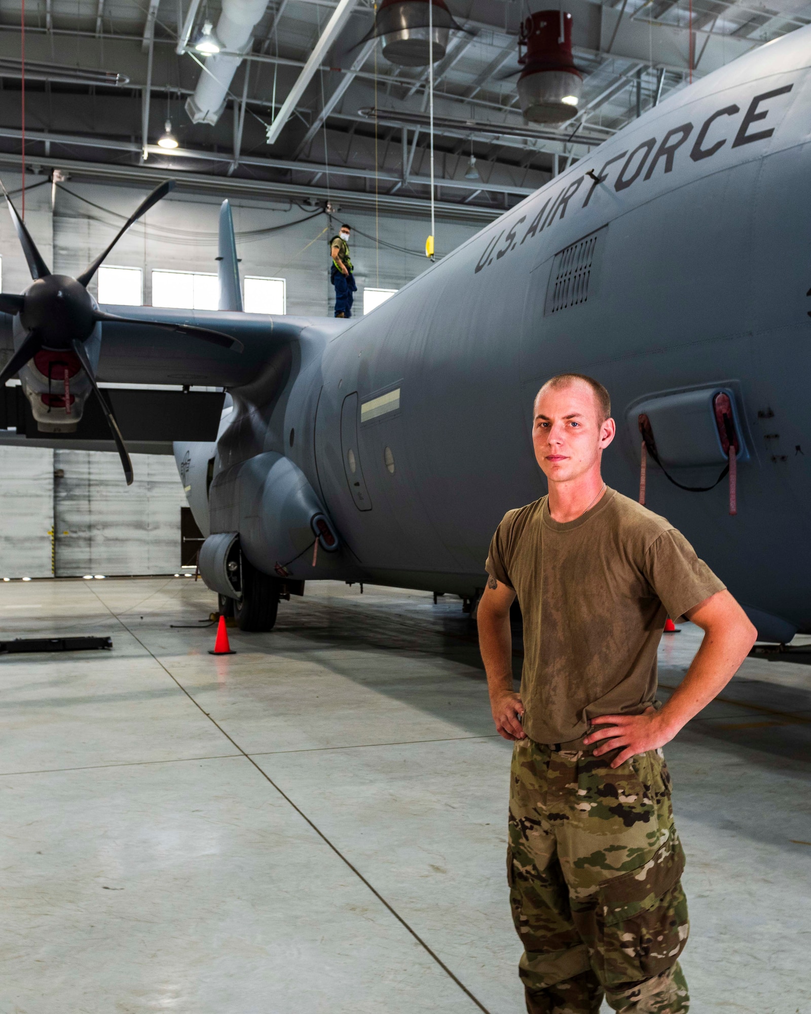 Air Force Reserve Staff Sgt. Tyler Blythe, 913th Maintenance Squadron, poses in front of the aircraft after he inspected the wing fuel tank of a C-130J Super Hercules at Little Rock Air Force Base, Ark., Aug. 6, 2020. Blythe enlisted into the active duty Air Force at 18 years old as a maintenance crew chief stationed in Arizona. (U.S. Air Force Reserve photo by Maj. Ashley Walker)