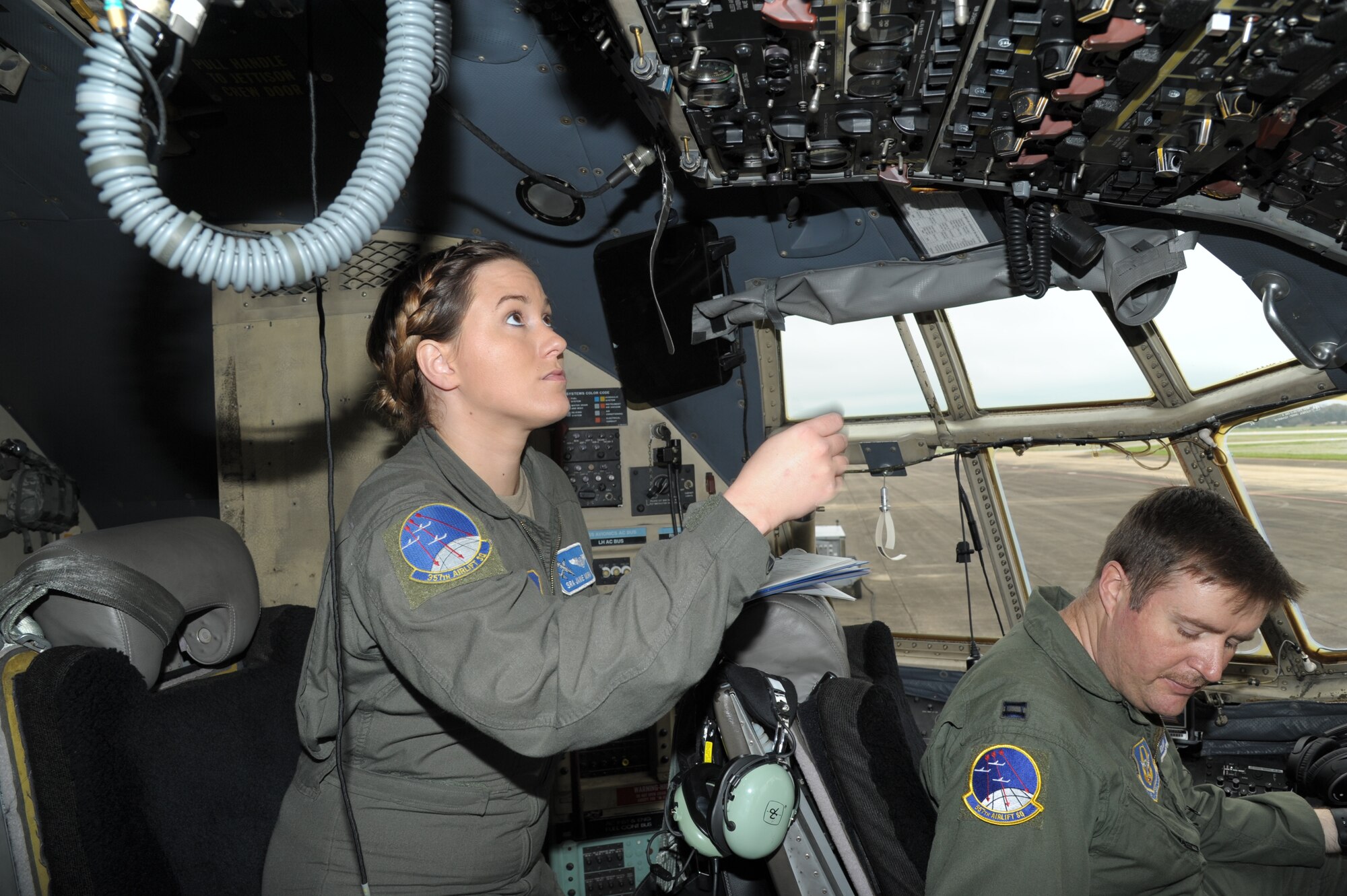 an aircrew member goes through preflight checklist