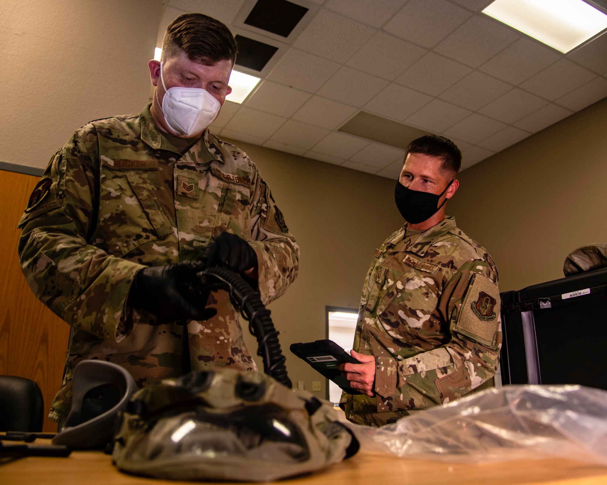 Air Force Reserve Master Sgt. David Underwood, 913th Aircrew Flight Equipment supervisor, oversees the inspection and repairs of flight helmets and oxygen equipment on July 16, 2020, at Little Rock Air Force Base, Ark. (U.S. Air Force Reserve photo by Maj. Ashley Walker)