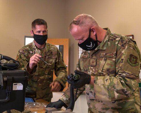 Air Force Reserve members of the 913th Aircrew Flight Equipment shop complete inspections and repairs to flight helmets and oxygen equipment July 16, 2020, at Little Rock Air Force Base, Ark. (U.S. Air Force Reserve photo by Maj. Ashley Walker)