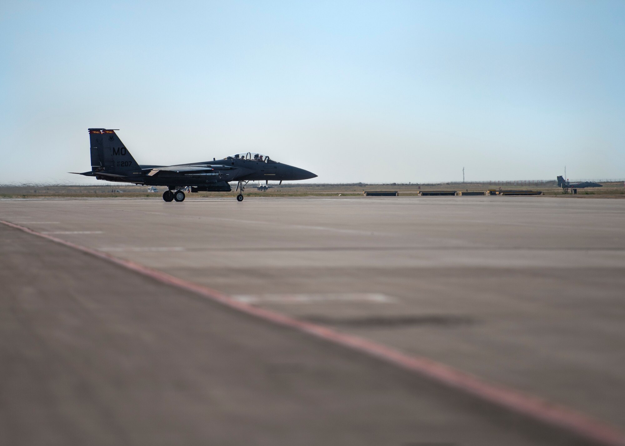 An F-15E Strike Eagle from the 389th Fighter Squadron, taxis down the flightline for Gunfighter Flag 20-1, Aug. 18, 2020, at Mountain Home Air Force Base, Idaho. GFF 20-1 provides units the opportunity to train with joint and international partners to complete combat and rescue exercises. (U.S. Air Force photo by Airman 1st Class Natalie Rubenak)