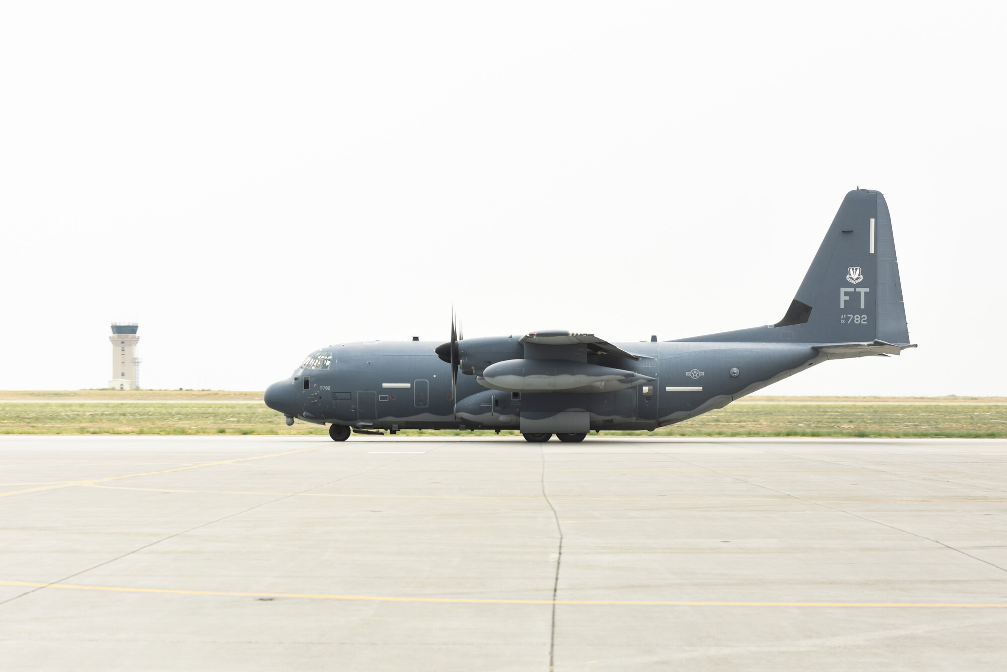 A U.S. Air Force C-130 Hercules taxis down the flightline during Gunfighter Flag 20-1, August 19, 2020, at Mountain Home Air Force Base, Idaho. The C-130 is the prime transport for airdropping troops and equipment into hostile areas. (U.S. Air Force photo by Airman 1st Class Akeem Campbell)