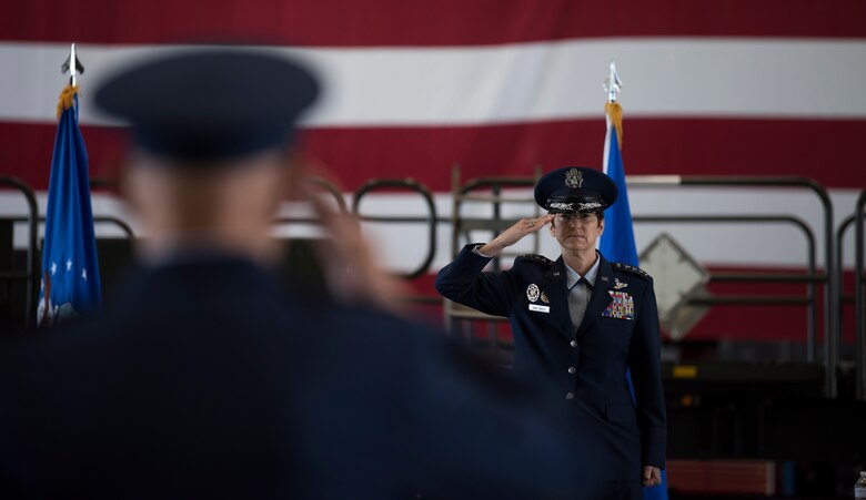 Gen. Jacqueline D. Van Ovost, commander of Air Mobility Command, returns her first salute to Lt. Gen. Brian Robinson, AMC deputy commander, during the AMC change of command ceremony at Scott Air Force Base, Illinois, Aug. 20, 2020. AMC provides rapid, global mobility and sustainment for America’s armed forces. (U.S. Air Force photo by Senior Airman Solomon Cook)