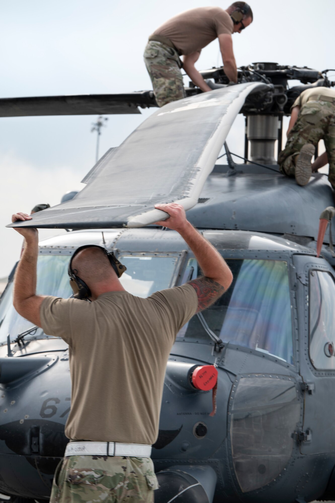 U.S. Air Force Airmen from the 923rd Aircraft Maintenance Squadron work a HH-60G Pave Hawk rotor engine, Aug. 17, 2020, at Mountain Home Air Force Base, Idaho. These Airmen are participating in Gunfighter Flag 20-1, where they trains with joint and international partners to complete combat and rescue exercises. (U.S. Air Force photo by Airman 1st Class Andrew Kobialka)