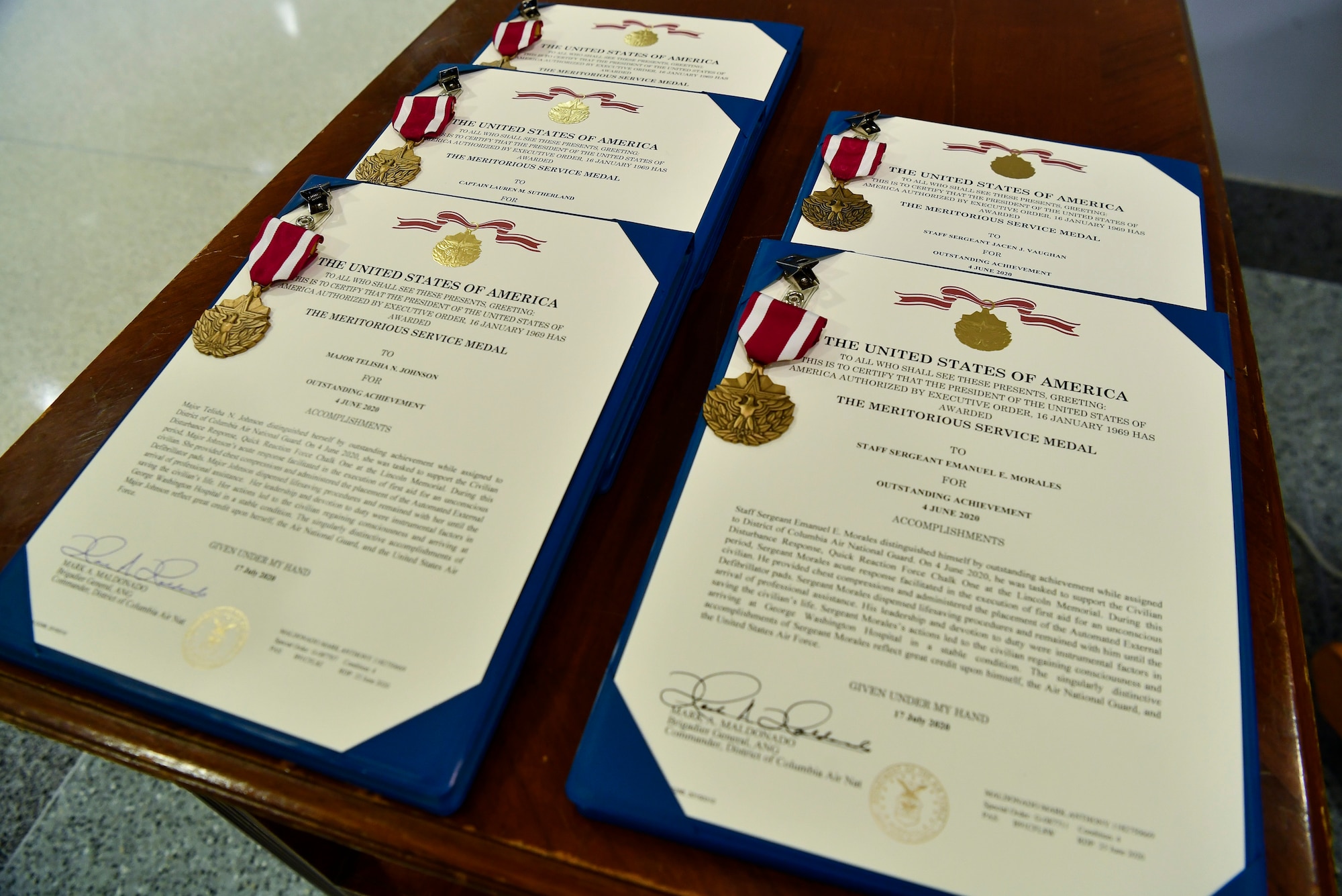 Meritorious Service Medals are arranged before being awarded to Air National Guard Airmen during a ceremony at the Pentagon, Arlington, Va., Aug. 19, 2020. The Meritorious Service Medal, established in 1969, recognizes individuals for meritorious noncombatant service to the United States. (U.S. Air Force photo by Eric Dietrich)