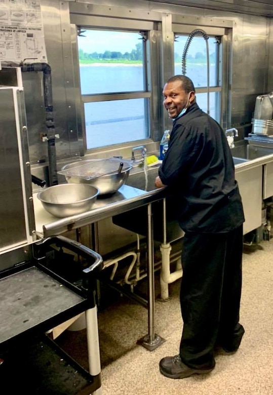 IN THE PHOTO, Dredge Hurley Ship Keeper Curtis Williams works in the kitchen area. Williams is celebrating a little over 30 years of service with the Memphis District U.S. Army Corps of Engineers.