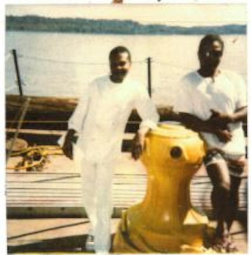 IN THE PHOTO, Dredge Hurley Ship Keeper Curtis Williams poses for the camera alongside his roommate while serving on the Bank Grading Unit in 1989. Williams is celebrating a little over 30 years of service with the Memphis District U.S. Army Corps of Engineers.