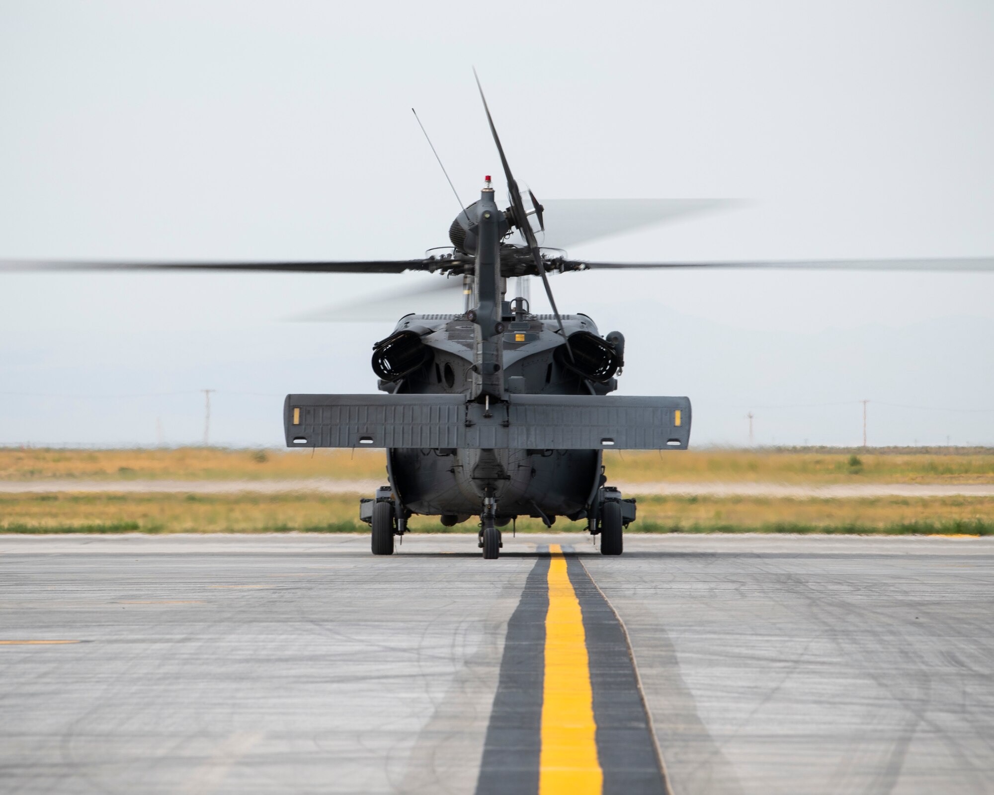 A U.S. Air Force HH-60G Pave Hawk from the 55th Rescue Squadron taxis down the flightline Aug. 17, 2020, at Mountain Home Air Force Base, Idaho. The 55th RQS is participating in Gunfighter Flag 20-1, where they train with joint and international partners to complete combat and rescue exercises. (U.S. Air Force photo by Airman 1st Class Andrew Kobialka)