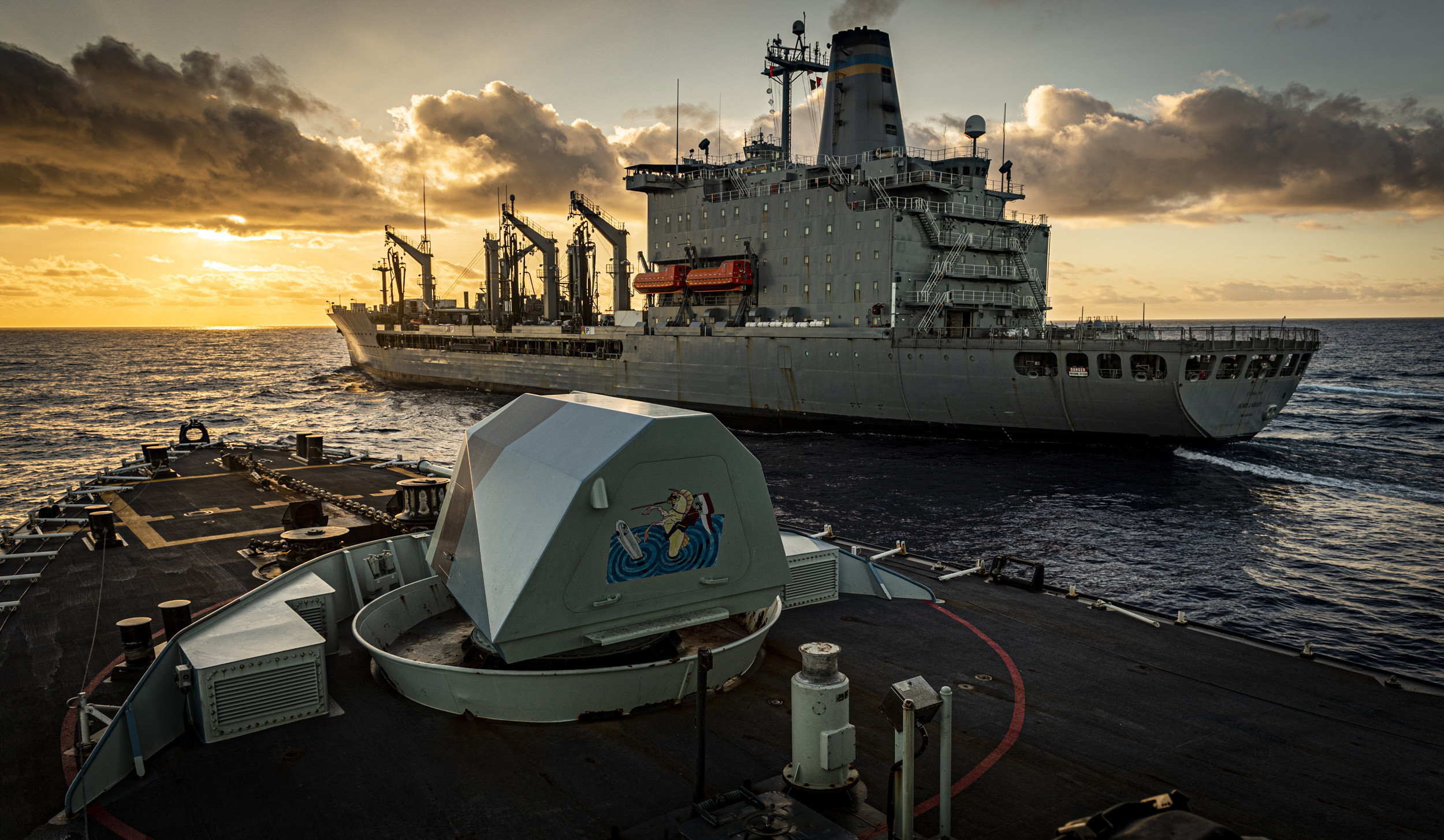 The Royal Canadian Navy frigate HMCS Regina (FFH 334) moves into position to conduct a replenishment-at-sea with USNS Henry J. Kaiser (T-AO 187).