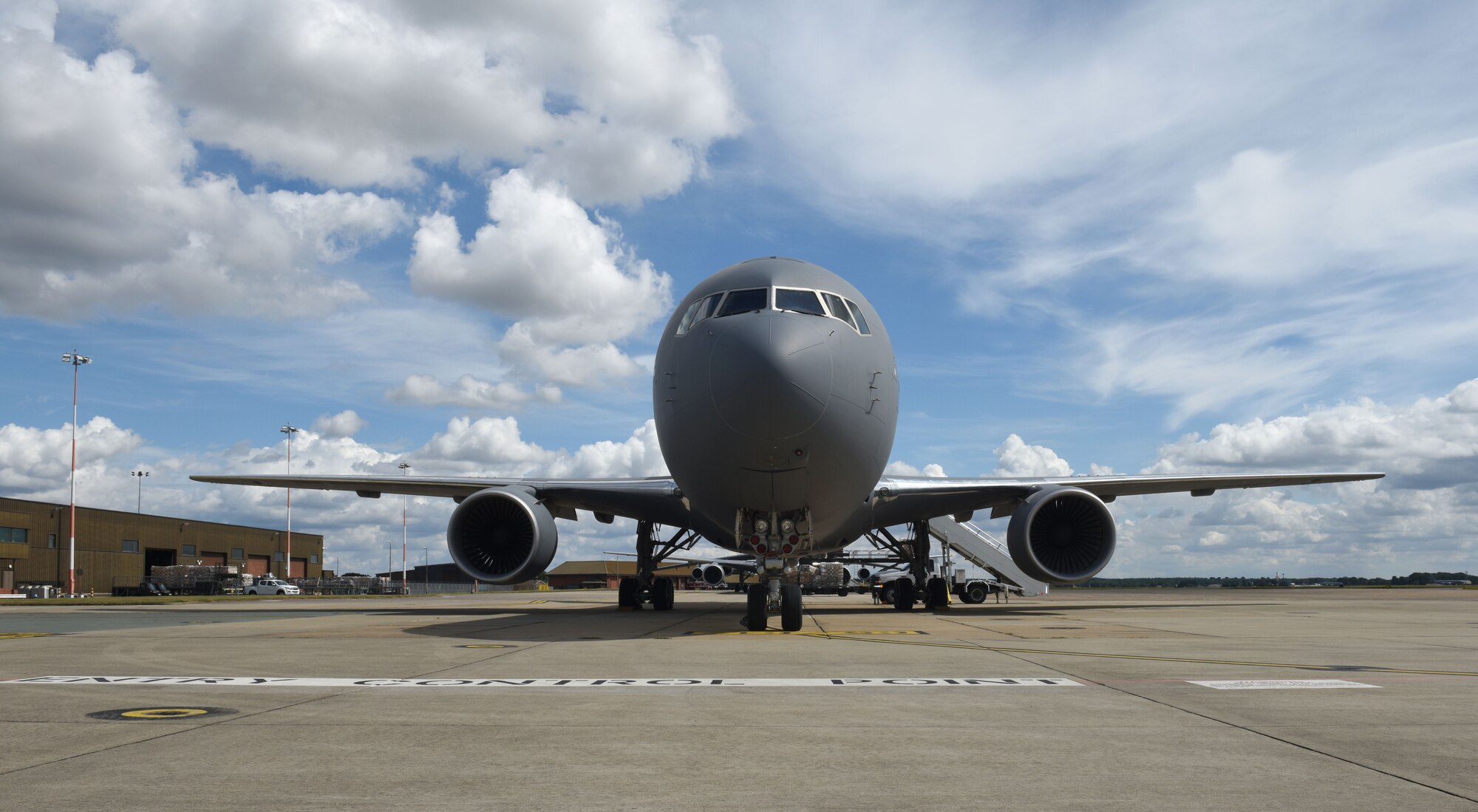 One of two KC-46A Pegasus’ sits on the flightline at RAF Mildenhall, England, Aug. 18, 2020. Aircrew and crew chiefs, along with two KC-46s, spent time here to train alongside KC-135 Stratotanker aircrew. Two high-bypass turbofans, mounted under 34-degree swept wings, power the KC-46A to take off at gross weights up to 415,000 pounds. (U.S. Air Force photo by Karen Abeyasekere)