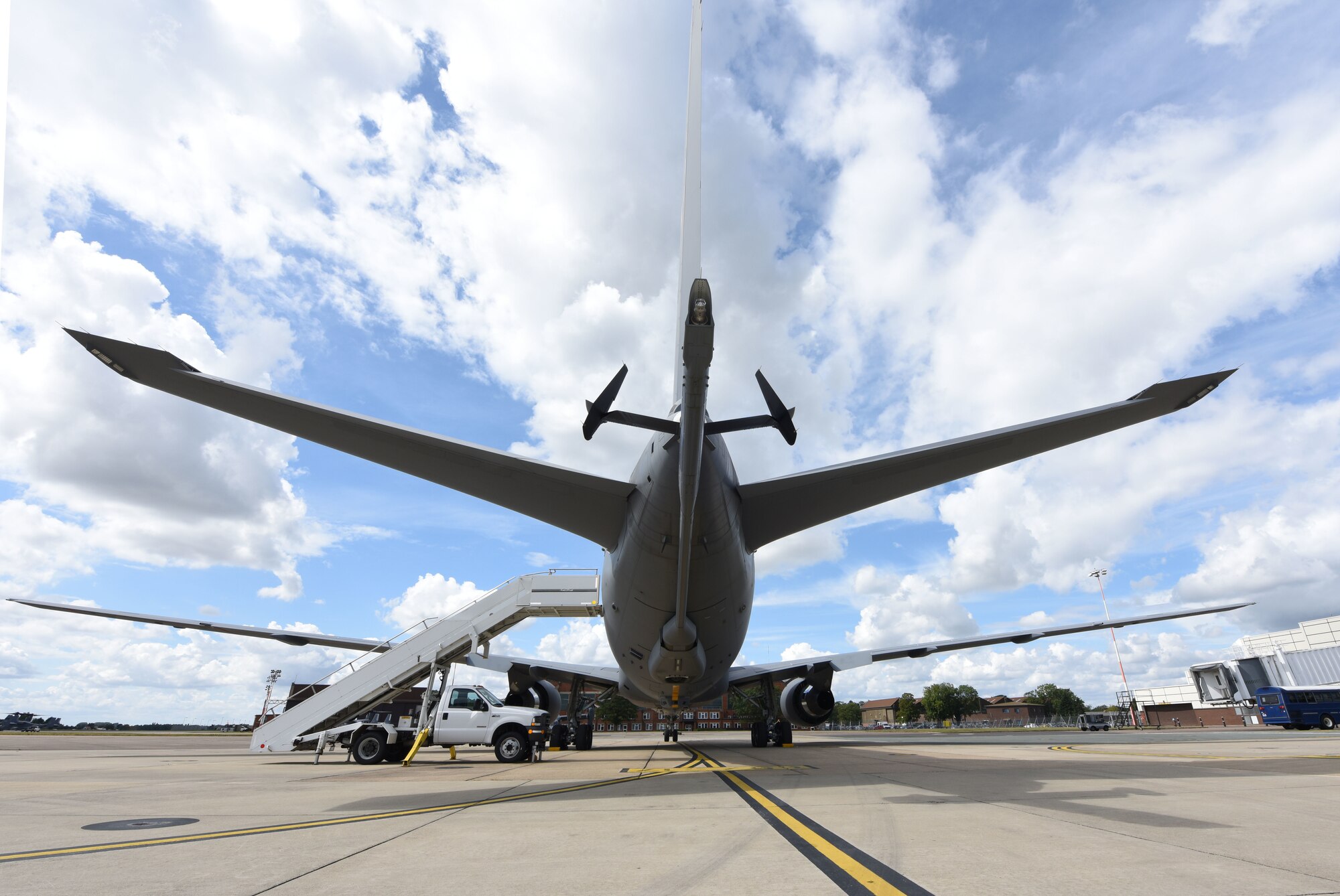 A KC-46A Pegasus sits on the flightline at RAF Mildenhall, England, Aug. 18, 2020. Aircrew and crew chiefs, along with two KC-46s, spent time here to train alongside KC-135 Stratotanker aircrew. Two high-bypass turbofans, mounted under 34-degree swept wings, power the KC-46A to take off at gross weights up to 415,000 pounds. (U.S. Air Force photo by Karen Abeyasekere)