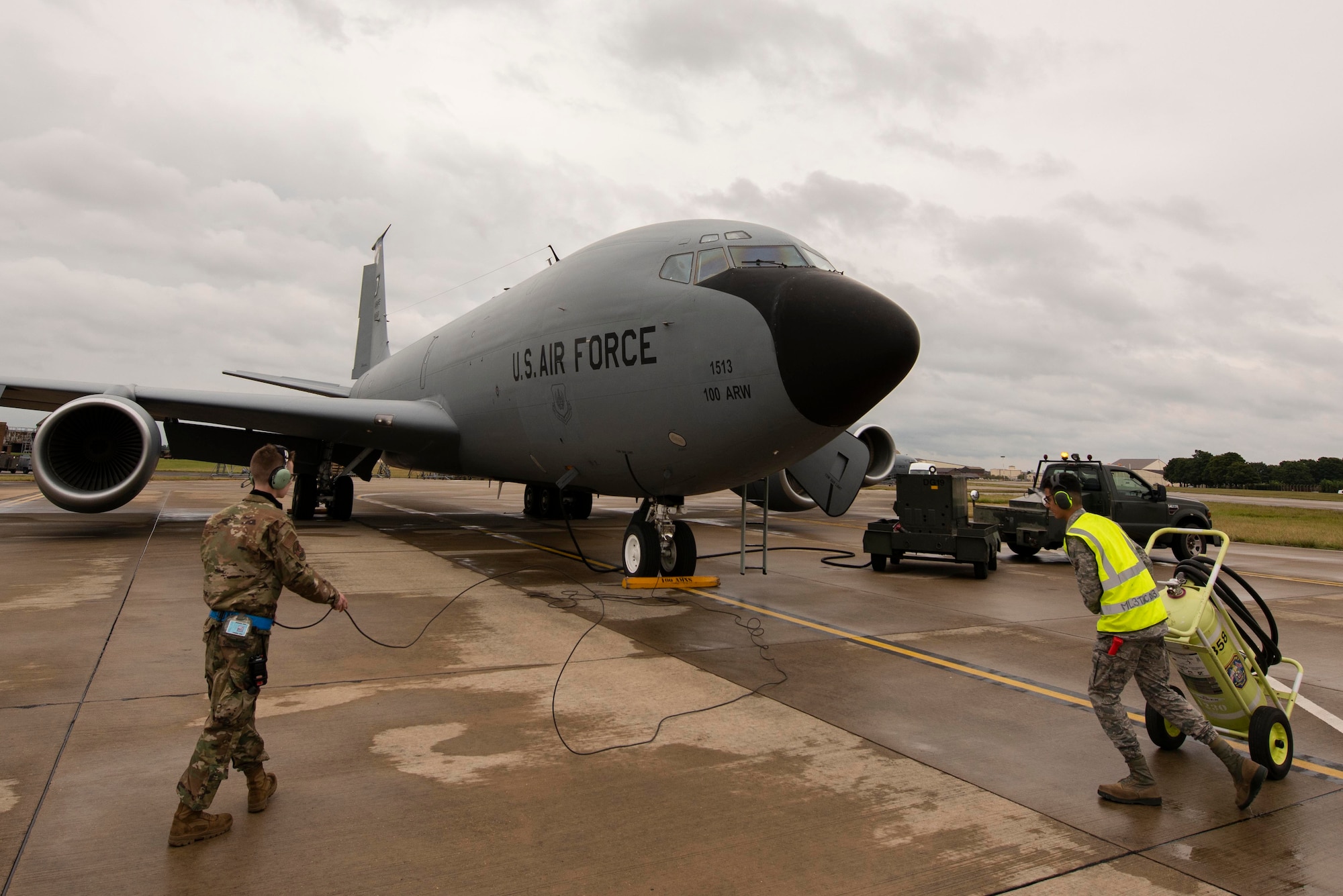 Airman Drake Koenig-Frederickson, 100th Aircraft Maintenance Squadron aerospace propulsion journeyman, left, and Airman 1st Class Nahyan Rivera-Wong, 100th AMXS aerospace propulsion apprentice, clear the flightline of aircraft ground equipment in preparation before the launch of a KC-135 Stratotanker aircraft at Royal Air Force Mildenhall, England, Aug. 19, 2020. The KC-135 provides global, rapid aerial refueling capability for Europe and Africa as the only permanent air refueling wing. (U.S. Air Force photo by Airman 1st Class Joseph Barron)