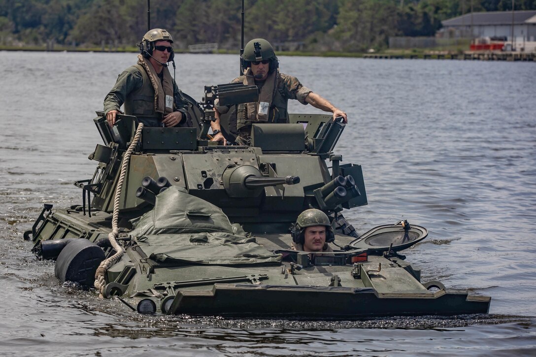 U.S. Marine Corps Maj. Gen. Francis L. Donovan, Commanding General of 2d Marine Division, rides on a Light Armored Vehicle-25 at Camp Lejeune, North Carolina, August 18, 2020. Donovan voiced his opinions on possible changes to doctrine concerning safety and training for 2d Light Armored Reconnaissance Battalion. (U.S. Marine Corps photo by Lance Cpl. Brian Bolin Jr.)