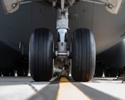 Staff Sgt. Brandon Whitley, an aerospace mechanic assigned to the 437th Aircraft Maintenance Squadron, connects an anti-collision light to the bottom of a C-17 Globemaster III at Joint Base Charleston, S.C., Aug. 18, 2020. The 437th AMXS inspects, services, and maintains the assigned C-17 aircraft at Joint Base Charleston.
