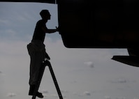 Staff Sgt. Jacob Songer, a crew chief assigned to the 437th Aircraft Maintenance Squadron, inspects the exhaust of an engine mounted on a C-17 Globemaster III at Joint Base Charleston, S.C., Aug. 18, 2020. The 437th AMXS inspects, services, and maintains the assigned C-17 aircraft at Joint Base Charleston.