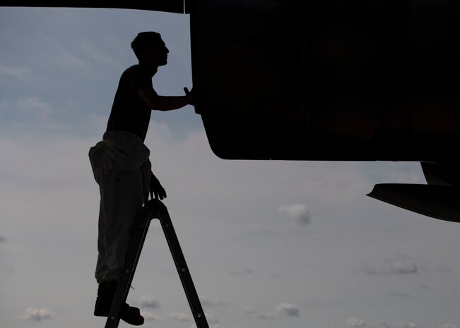 Staff Sgt. Jacob Songer, a crew chief assigned to the 437th Aircraft Maintenance Squadron, inspects the exhaust of an engine mounted on a C-17 Globemaster III at Joint Base Charleston, S.C., Aug. 18, 2020. The 437th AMXS inspects, services, and maintains the assigned C-17 aircraft at Joint Base Charleston.