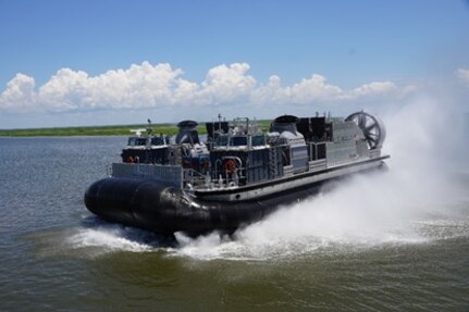 Ship to Shore Connector (SSC), Landing Craft, Air Cushion (LCAC) 100, conducts exercises in the local waterways of Louisiana. The craft is the evolutionary replacement for the existing fleet of Landing Craft Air Cushion vehicles.  (Courtesy Textron Systems)