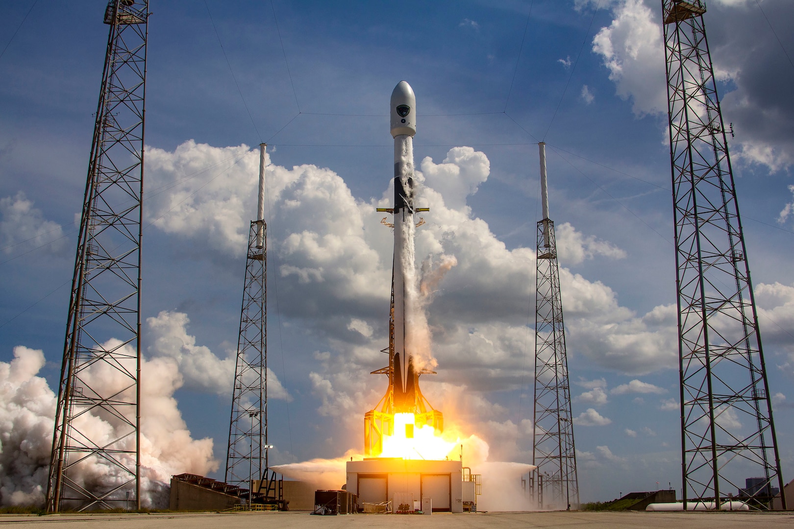 A rocket launches from a launch pad at Cape Canaveral Air Force Station.