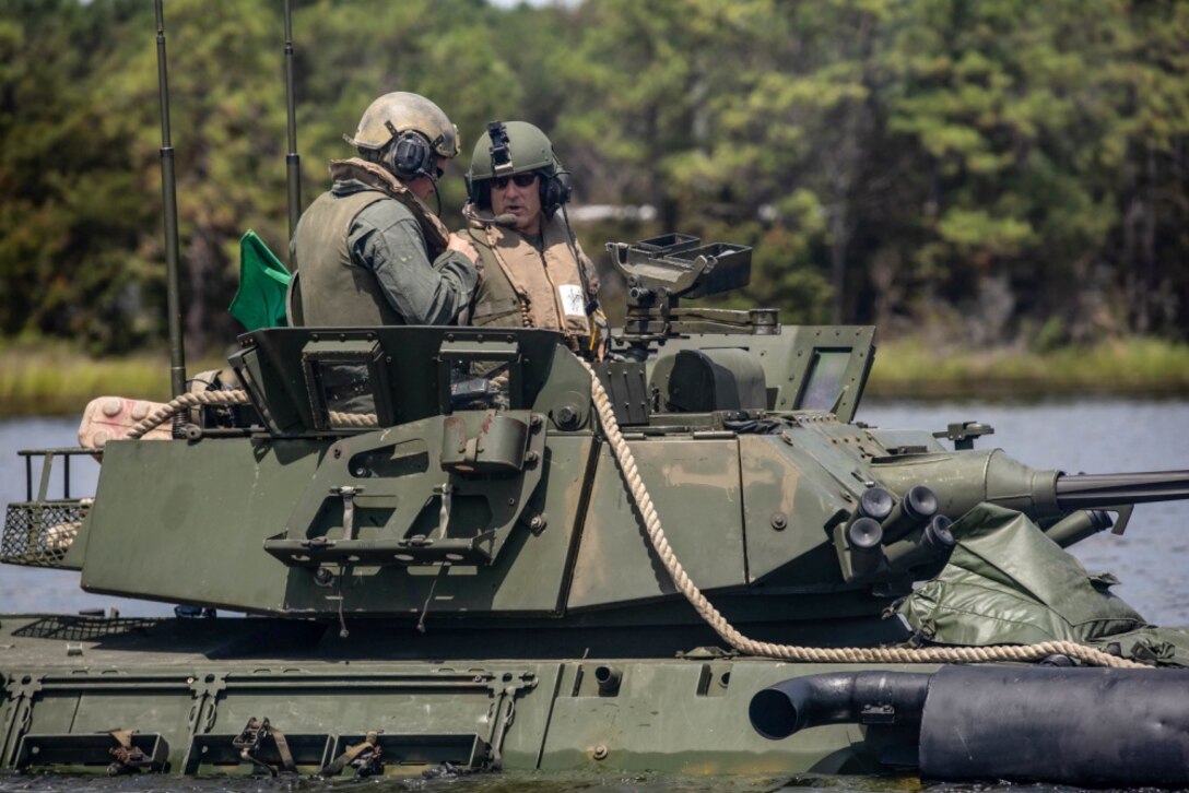 U.S. Marine Corps Maj. Gen. Francis L. Donovan, Commanding General of 2d Marine Division, rides on a Light Armored Vehicle-25 at Camp Lejeune, North Carolina, August 18, 2020. Donovan voiced his opinions on possible changes to doctrine concerning safety and training for 2d Light Armored Reconnaissance Battalion. (U.S. Marine Corps photo by Lance Cpl. Brian Bolin Jr.)