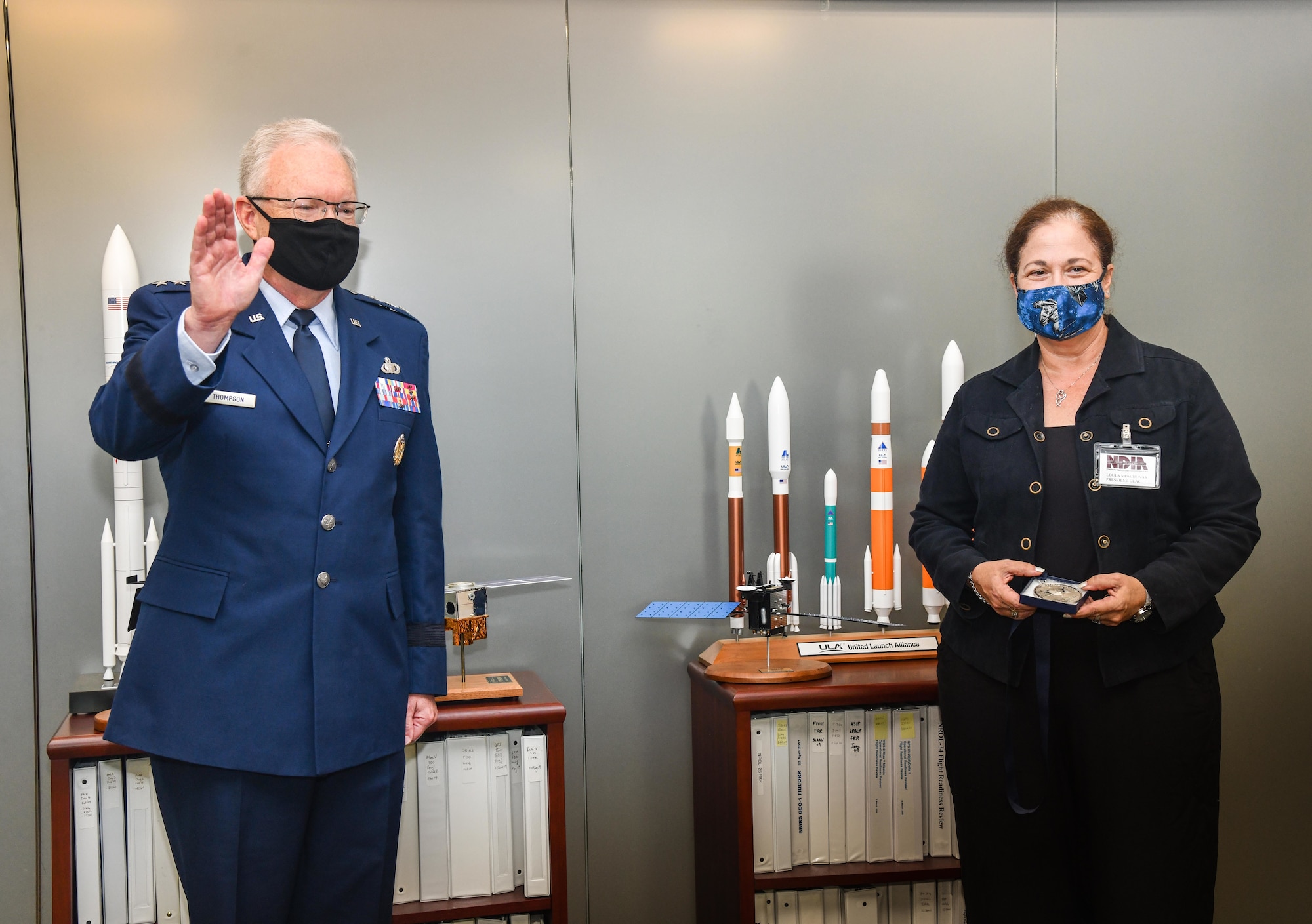 U.S. Air Force Lt. Gen. John F. Thompson, Space and Missile Systems Center commander, stands alongside Loula Moschonas, National Defense Industrial Association Los Angeles Chapter President, during the Space Warfighting Industry Forum, August 20, 2020 at Los Angeles Air Force Base, California. Thompson was presented the 2020 Gen. James V. Hartinger Award on behalf of the Rocky Mountain Chapter of the NDIA. (U.S. Space Force photo by Van Ha)