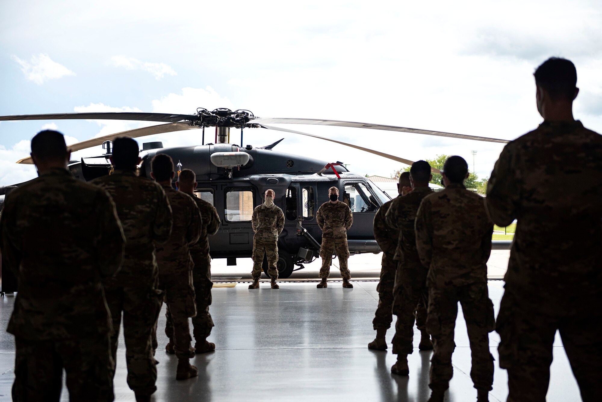 Photo of Airmen congratulating Airmen.