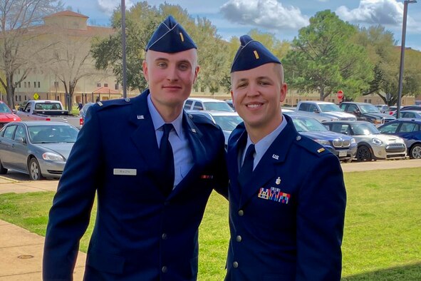 2nd Lt. Joseph P. Bodd, 732nd Airlift Squadron, pilot trainee, with the 514th Air Mobility Wing, Joint Base McGuire-Dix-Lakehurst, N.J., poses for a photo with a colleague following their graduation from Officer Training School at Maxwell Air Force Base, Ala., March 13, 2020. (U.S. Air Force courtesy photo)