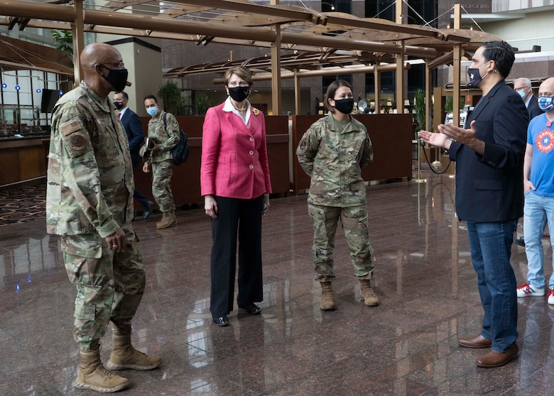 Lt. Col. Matthew Scott, (right) AFWERX Austin director, guides Secretary of the Air Force Barbara Barrett, Chief of Staff of the Air Force Gen. Charles Q. Brown, Jr., and Chief Master Sgt. of the Air Force JoAnne S. Bass through the AFWERX Austin Hub, Texas,  Aug. 20, 2020. The visit highlighted how Air Force Guard and Reserve talent power the AFWERX Austin mission and projects, and demonstrated how Airmen-empowered projects, combined with strategic partnerships and collaborations with industry, have enabled innovative efforts to thrive within the Air Force. (Air National Guard photo by Staff Sgt. Jordyn Fetter)