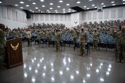 Chief of Staff of the Air Force Gen. Charles Q. Brown Jr. administers the reaffirmation of oath during tour of the Pfingston Reception Center Aug. 21, 2020, at Joint Base San Antonio-Lackland, Texas.