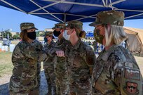 U.S. Chief Master Sergeant of the Air Force JoAnne Bass visits with 59th Medical Wing medics Aug. 21, 2020, at JBSA-Lackland, Texas.